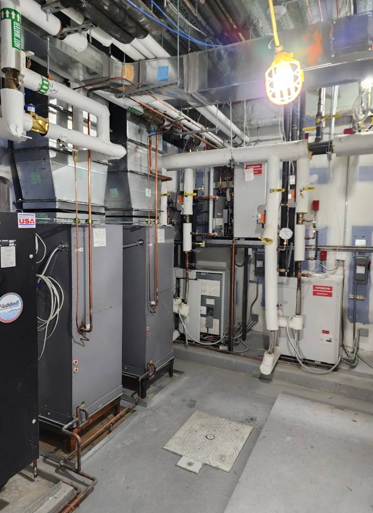 A room filled with many different types of heating and air conditioning units.